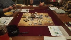 Here is a Dining Game Table in Classic French Couture finish and Burgundy velveteen fabric. They are playing the Pathfinder Adventure Card Game--and look at all the space, not just in the play area, but on the edges! Room for dinner and dice. Photo courtesy of Josh Demaree. Thanks Josh!